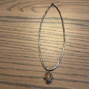 Stone & Silver plated metal multicolor charm on silver & 18” black silk chord.